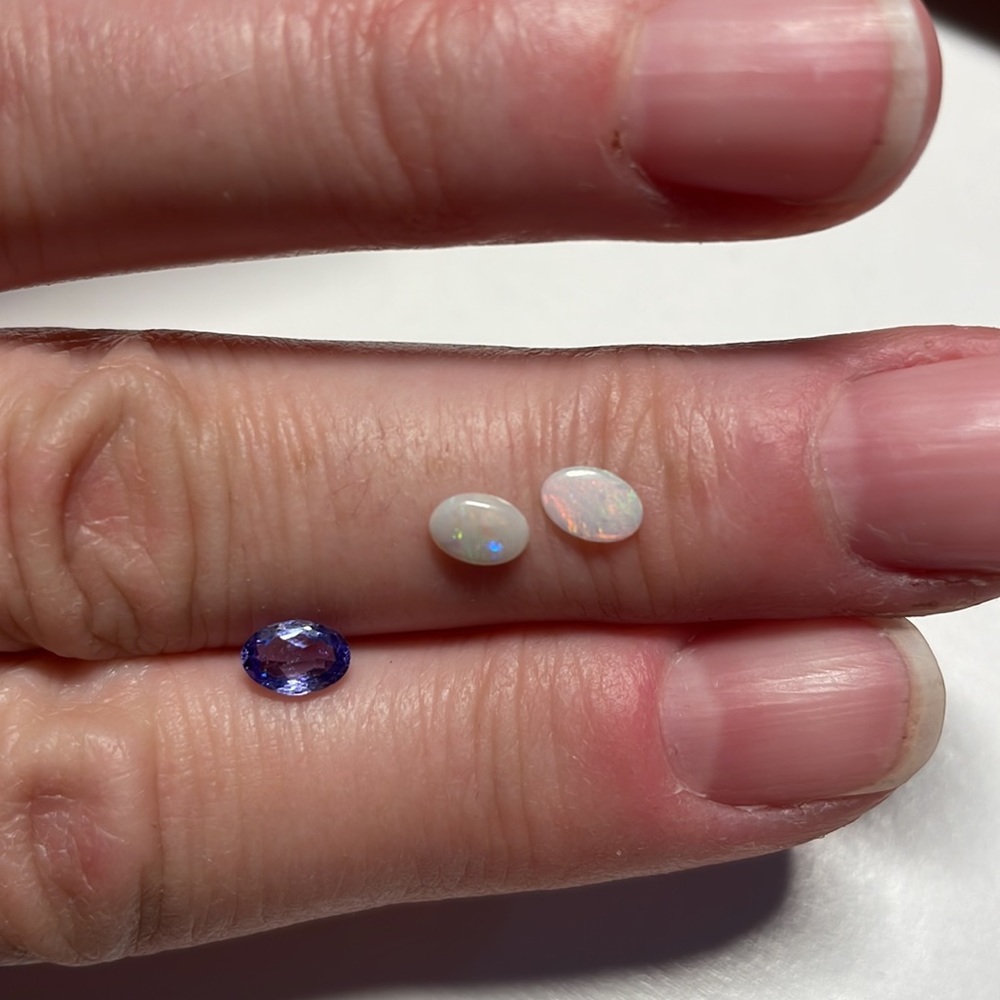 3 Opals And One Tanzanite Oval Gems View 3